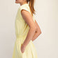 BUTTER SHORT SLEEVE QUARTER ZIP ROMPER