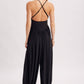 V-NECK RELAXED FLOWY LEGS JUMPSUIT CRISS-CROSS OPEN BACK