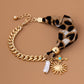 SCARF CHARM BRACELET- SUNBLAST CROSS PEARL CHARM | 80B1560