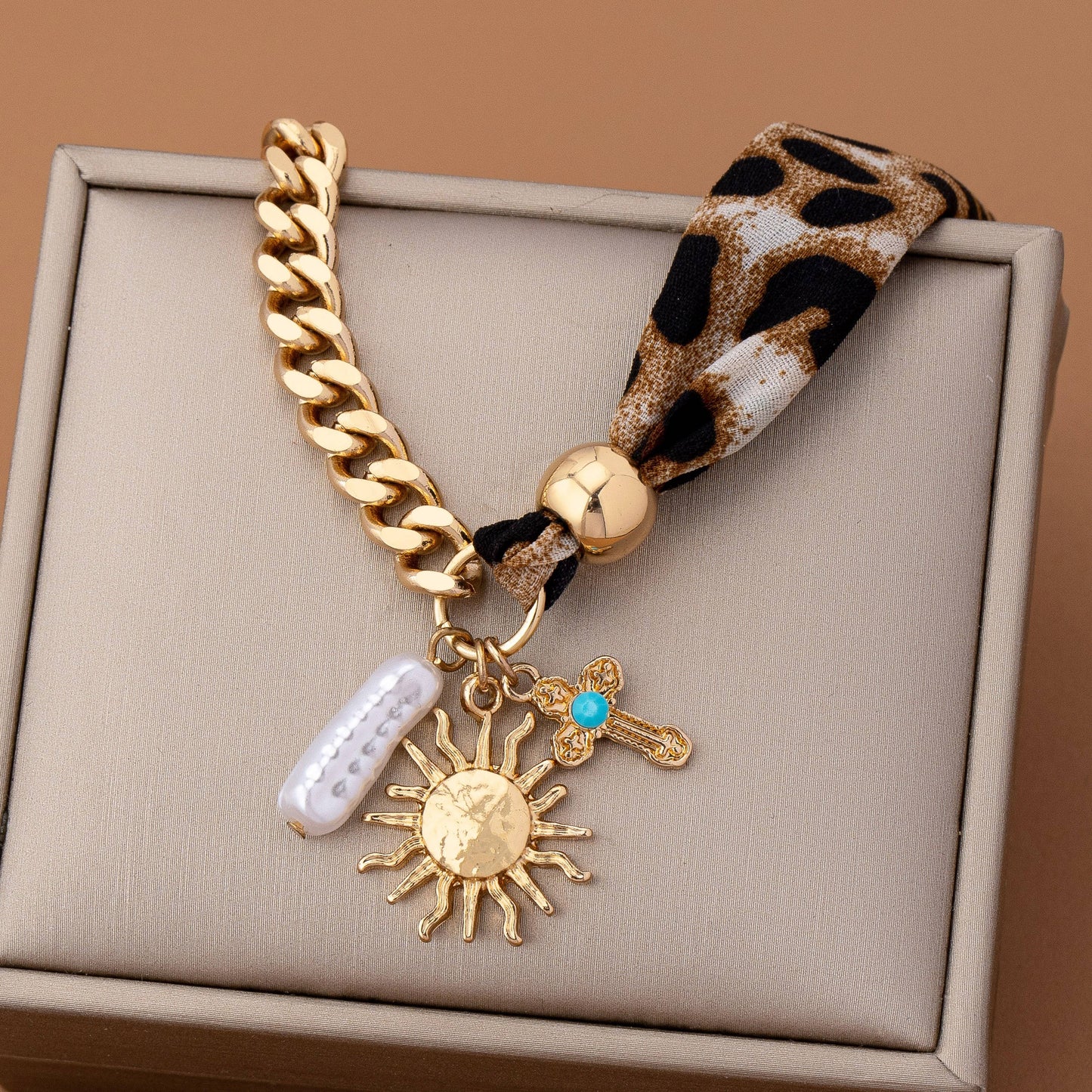 SCARF CHARM BRACELET- SUNBLAST CROSS PEARL CHARM | 80B1560