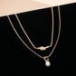 Layer Knot & Acorn Pendant Duo Drop Necklace | 80N92865