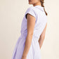 BUTTER SHORT SLEEVE QUARTER ZIP ROMPER