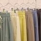 FRENCH TERRY OUT SEAM DETAIL TULIP HEM PANTS