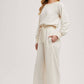 WIDE NECK OFF THE SHOULDER KNIT JUMPSUIT