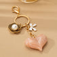 BAG CHARM KEY CHAIN-SWIRL HEART PERAL FLORAL BOW | 80K090