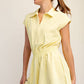 BUTTER SHORT SLEEVE QUARTER ZIP ROMPER