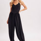 V-NECK RELAXED FLOWY LEGS JUMPSUIT CRISS-CROSS OPEN BACK