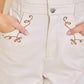 Embroidered Halter Romper with Button Front
