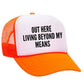 Out Here Living Beyond My Means Trucker Hat
