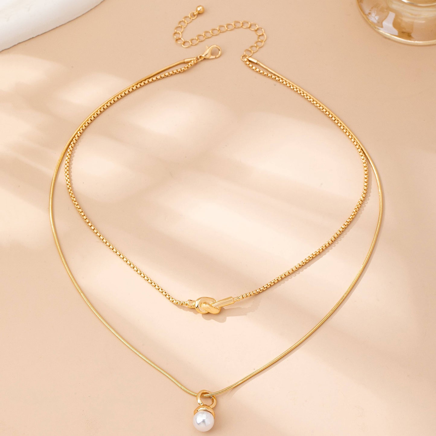 Layer Knot & Acorn Pendant Duo Drop Necklace | 80N92865