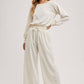 WIDE NECK OFF THE SHOULDER KNIT JUMPSUIT