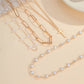 Layered Gold & Pearl Cross Statement Necklace Set | 40NK9673