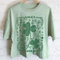 LUCKY CHARM CLOVER GRAPHIC LONG CROP TOP
