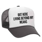 Out Here Living Beyond My Means Trucker Hat