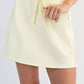 MODAL SCUBA FLAT PIPING SKORT