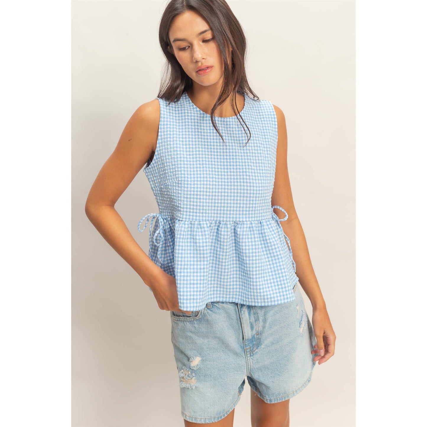 Gingham Sleeveless Peplum Top With Side Ties