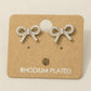 Gold Dipped Cz Pave Ribbon Bow Stud Earrings
