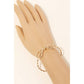 Metallic Bow Twist Cuff Bracelet