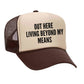 Out Here Living Beyond My Means Trucker Hat
