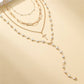 Layered Gold & Pearl Cross Statement Necklace Set | 40NK9673