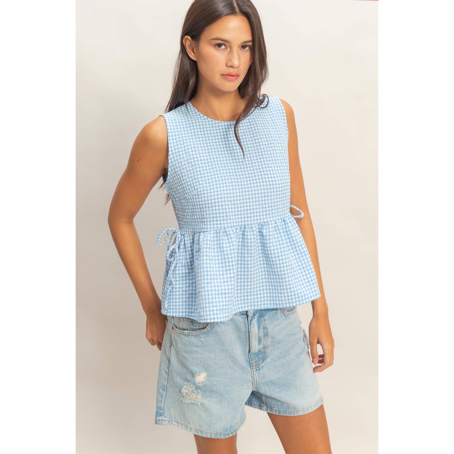 Gingham Sleeveless Peplum Top With Side Ties